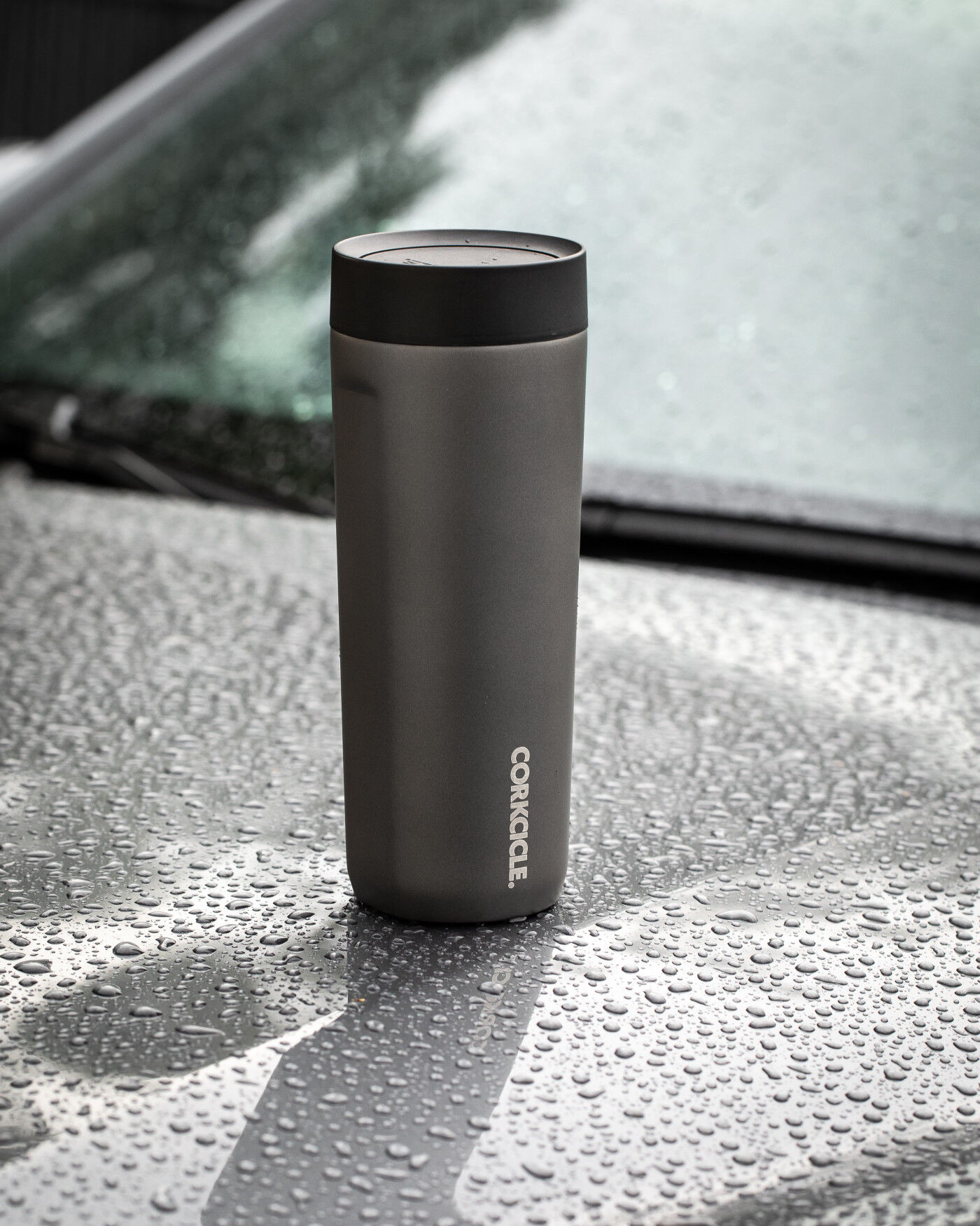 https://www.drivemerch.com/wp-content/uploads/2022/10/branded-corkcicle-commuter-cup-17oz-slate-lifestyle.jpg